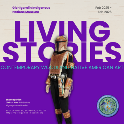 A figure in birchbark armor standing in front of the words "Living Stories"